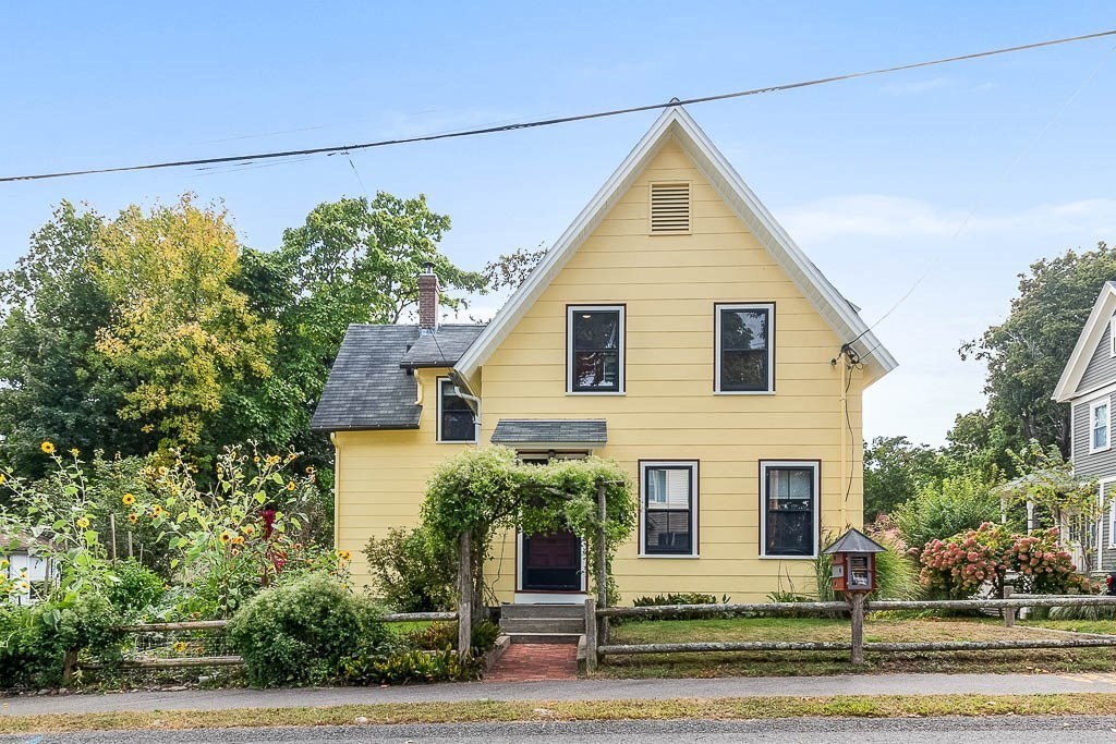 56 Clark Street Dedham, MA 02026 - Photo 1 of 42 a view of a house with a yard