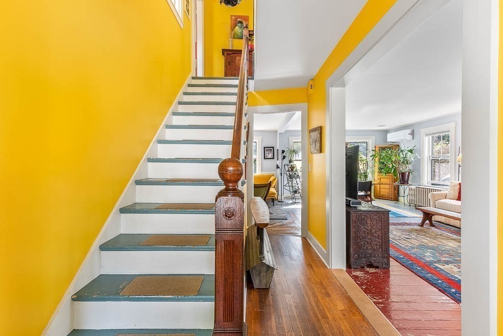 56 Clark Street Dedham, MA 02026 - Photo 33 of 42 a view of entryway and hall with wooden floor