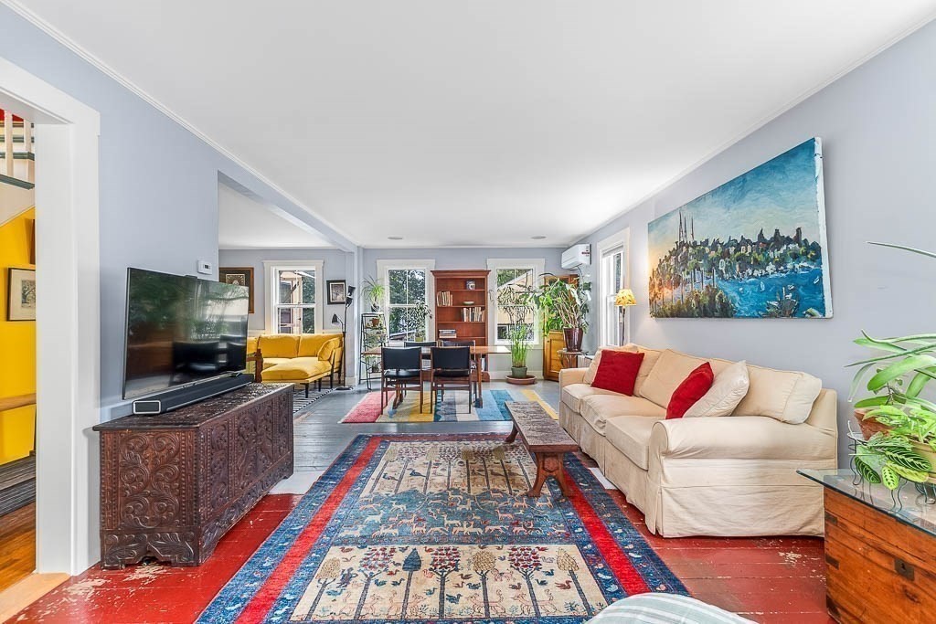 56 Clark Street Dedham, MA 02026 - Photo 7 of 42 a living room with furniture and a flat screen tv