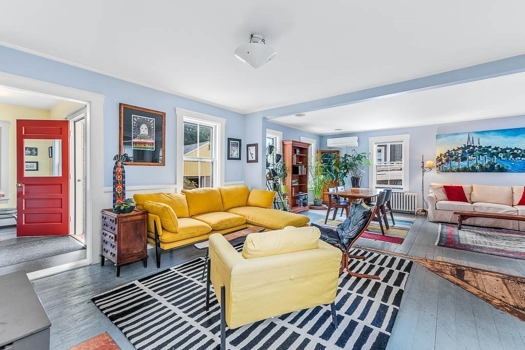 56 Clark Street Dedham, MA 02026 - Photo 9 of 42 a living room with furniture and wooden floor