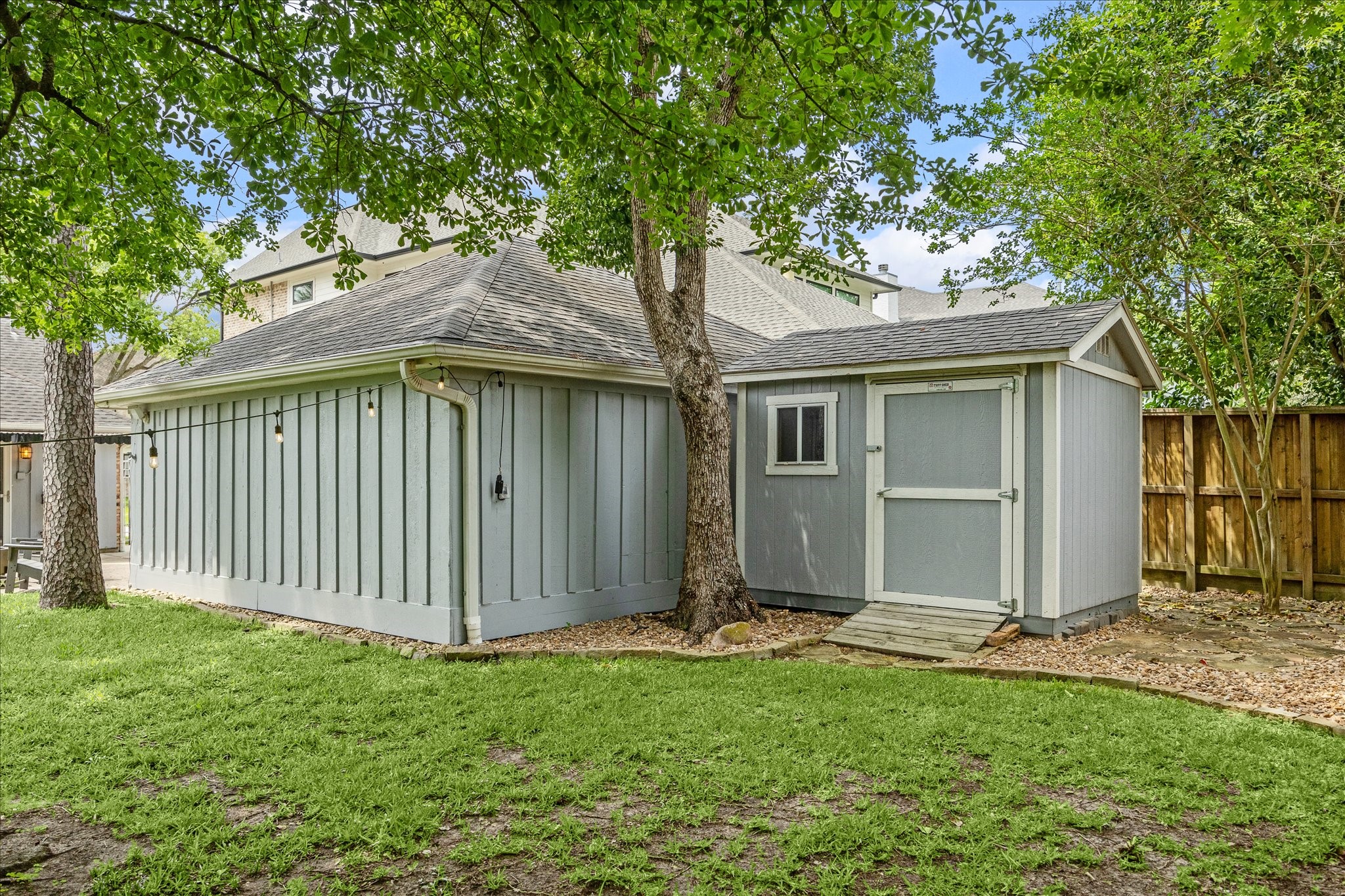 1018 Ben Hur Drive Spring Valley Village, TX 77055 - Photo 27 of 30 A storage shed tucked at the back of the property offers additional storage or the perfect space for a workshop.