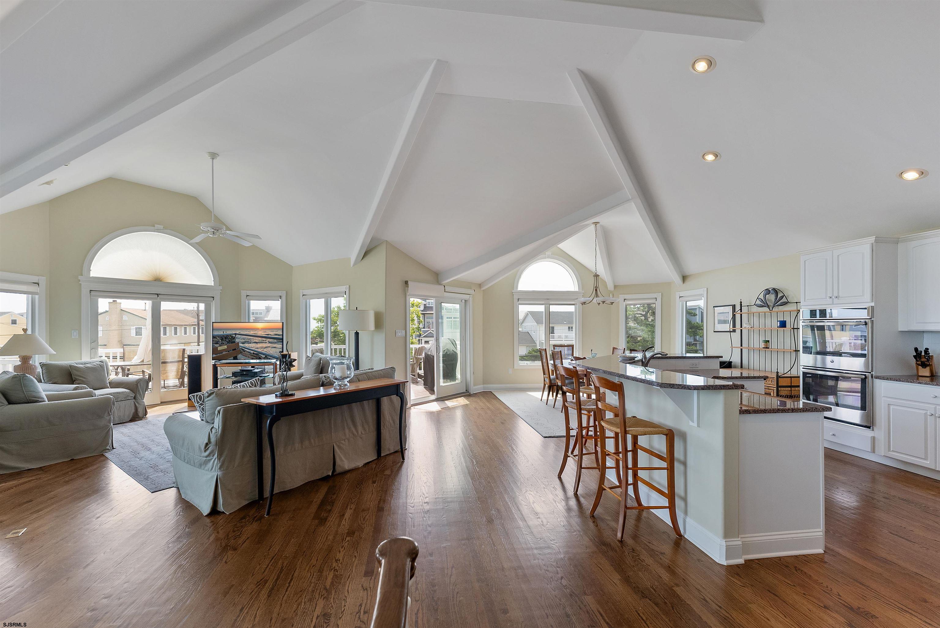 11901 2nd Avenue Stone Harbor, NJ 08247 - Photo 25 of 40 a view of a dining room with furniture window and wooden floor