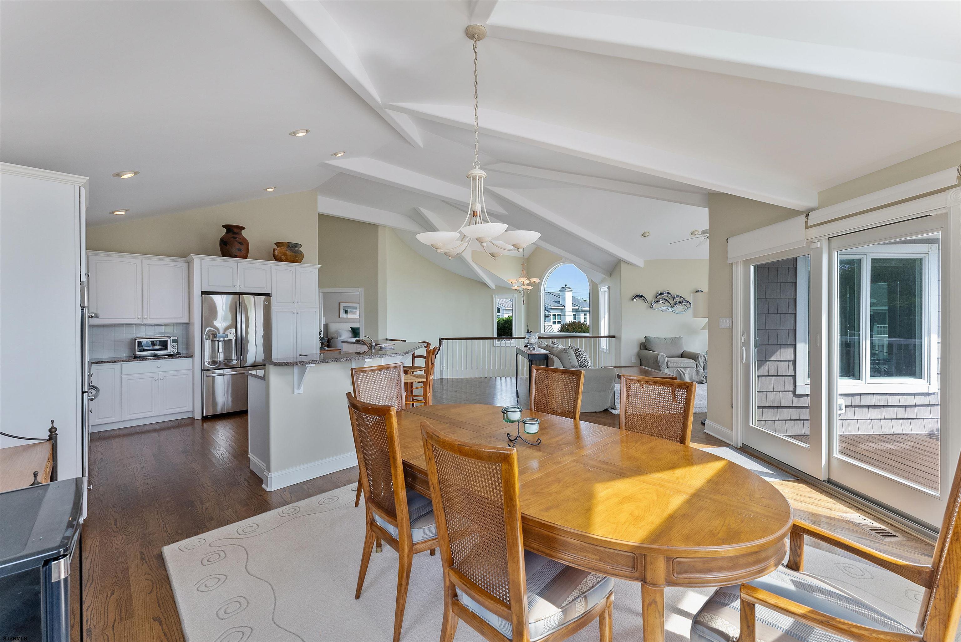 11901 2nd Avenue Stone Harbor, NJ 08247 - Photo 27 of 40 a view of a dining room with furniture and wooden floor