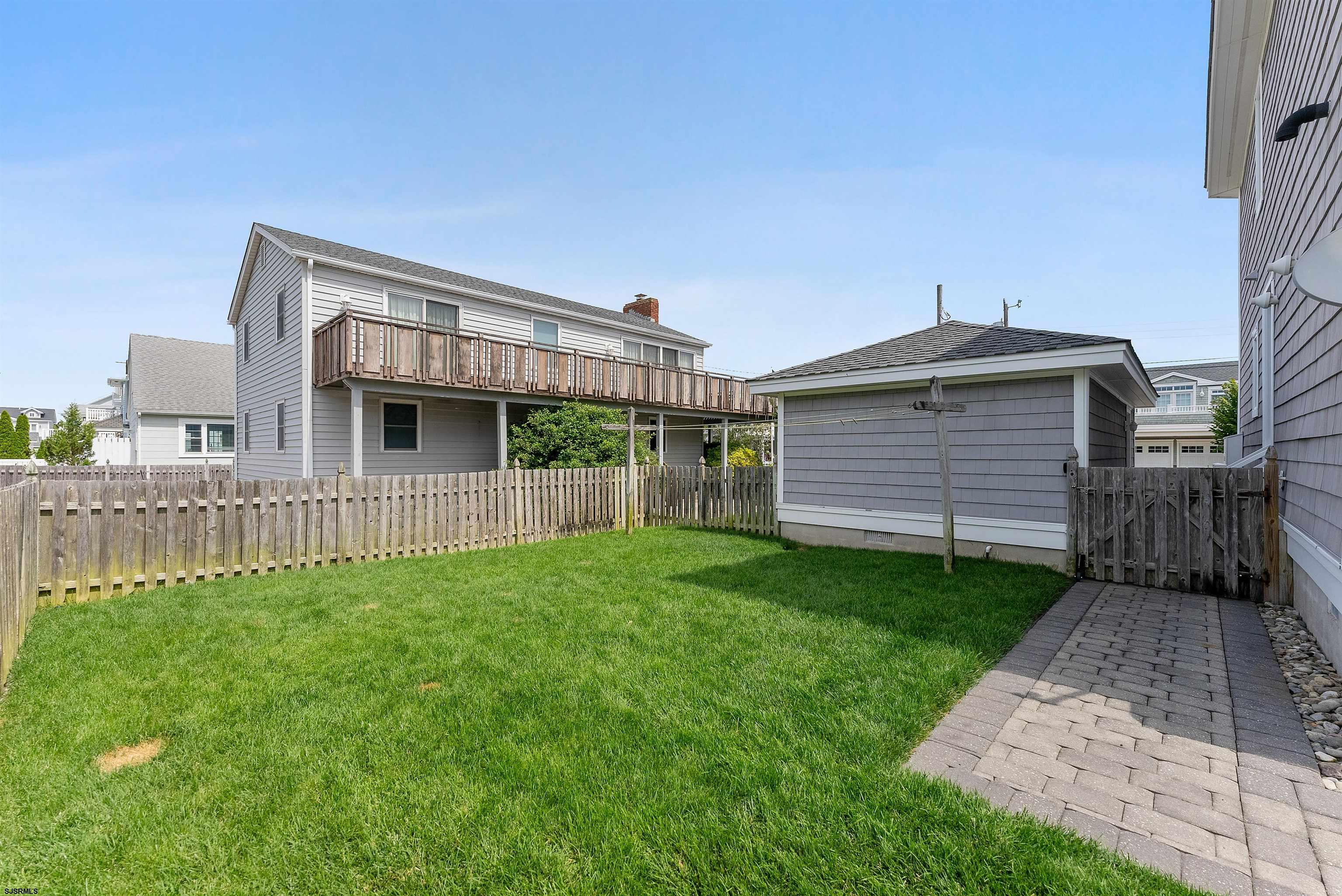 11901 2nd Avenue Stone Harbor, NJ 08247 - Photo 38 of 40 a view of backyard with a garden and deck