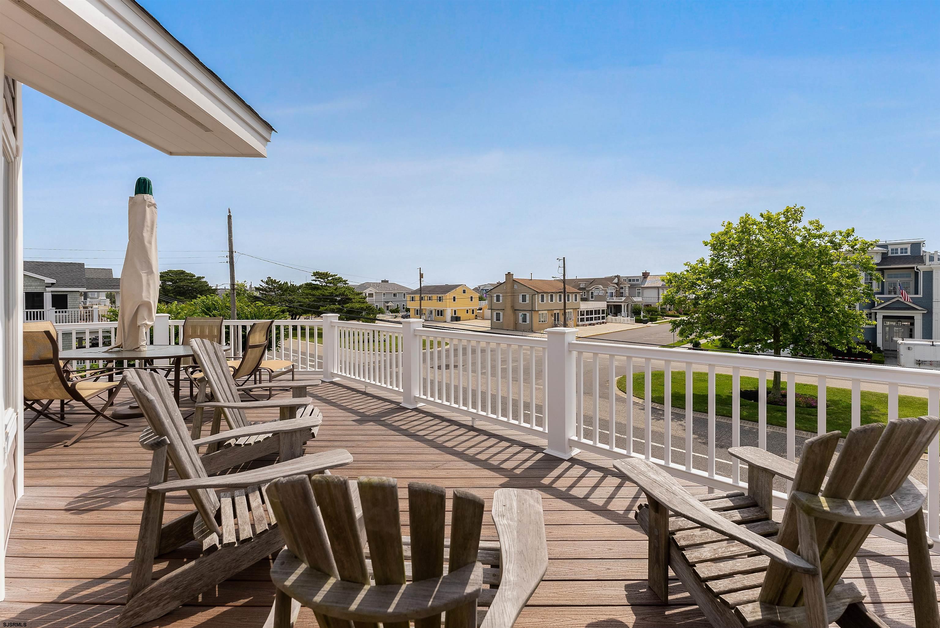 11901 2nd Avenue Stone Harbor, NJ 08247 - Photo 9 of 40 a view of a balcony with chairs