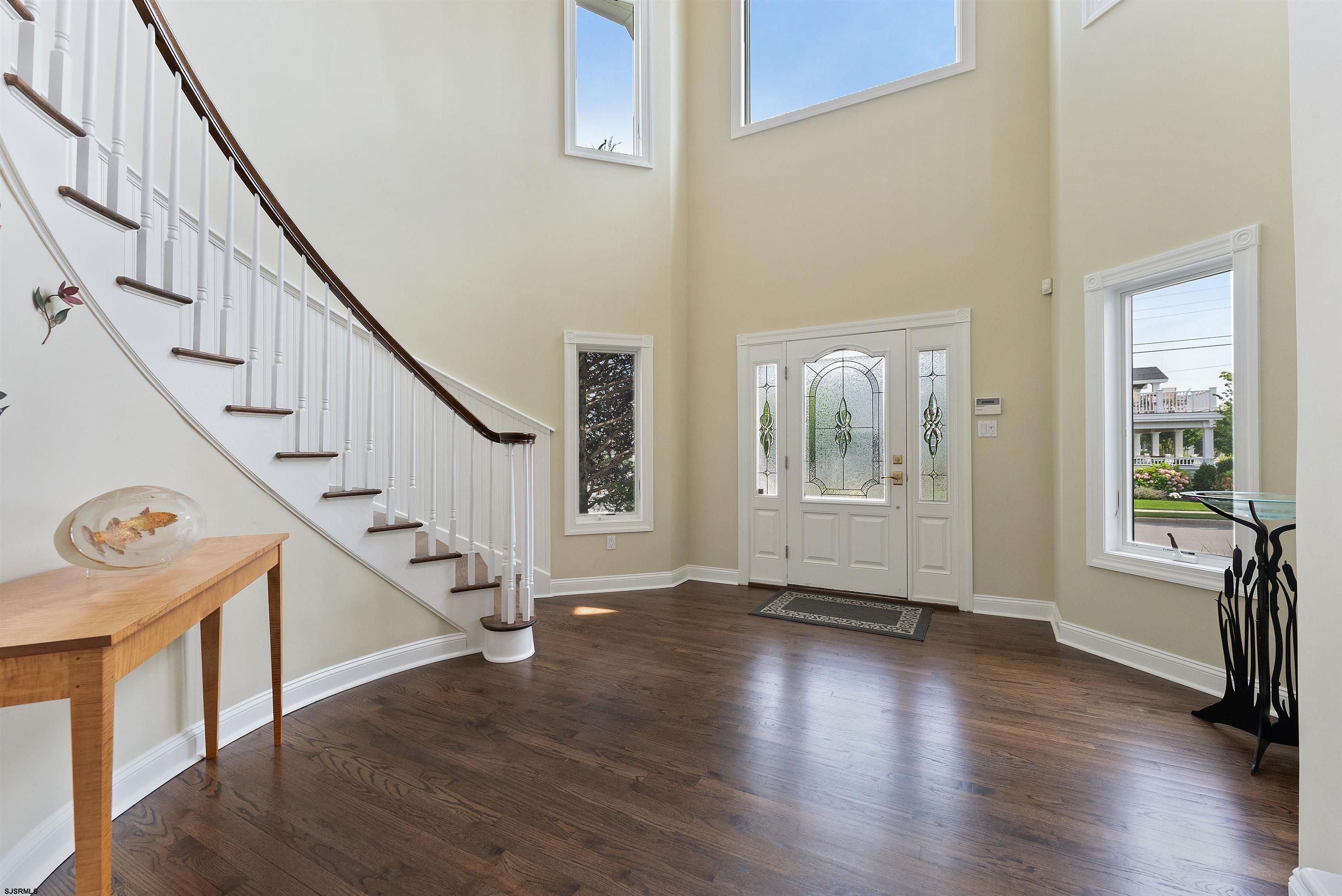 11901 2nd Avenue Stone Harbor, NJ 08247 - Photo 10 of 40 a view of an entryway with wooden floor and door