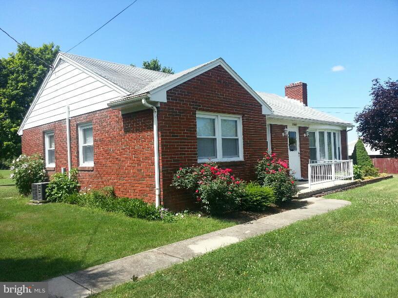 11410 Airport Road Waynesboro, PA 17268 - Photo 1 of 14 a front view of house with a garden