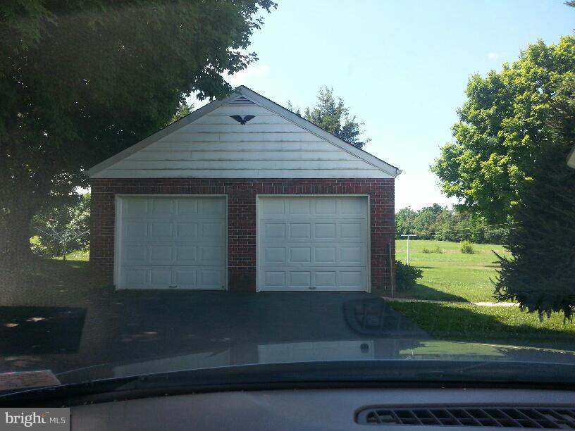 11410 Airport Road Waynesboro, PA 17268 - Photo 14 of 14 a front view of a house with garden
