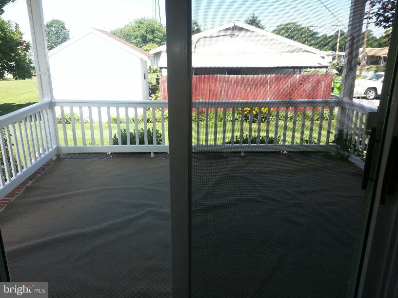 11410 Airport Road Waynesboro, PA 17268 - Photo 4 of 14 a view of a porch with a yard