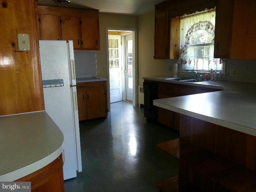 11410 Airport Road Waynesboro, PA 17268 - Photo 5 of 14 a kitchen with counter top space and a window