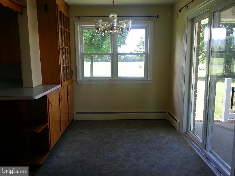 11410 Airport Road Waynesboro, PA 17268 - Photo 6 of 14 a view of room with window and hallway