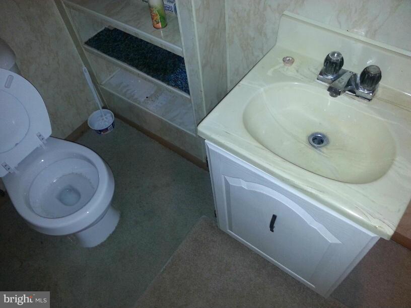 11410 Airport Road Waynesboro, PA 17268 - Photo 9 of 14 a bathroom with a sink and toilet