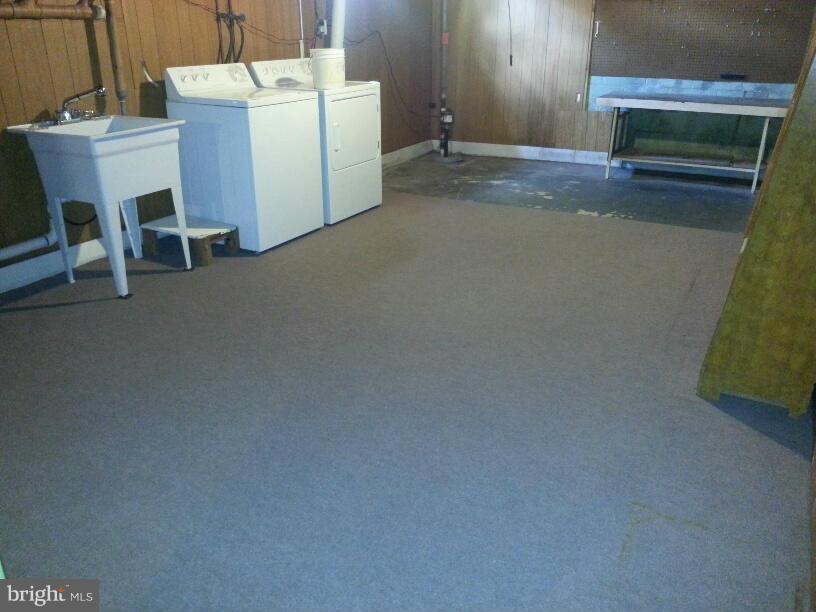 11410 Airport Road Waynesboro, PA 17268 - Photo 10 of 14 a view of a room with chairs and refrigerator