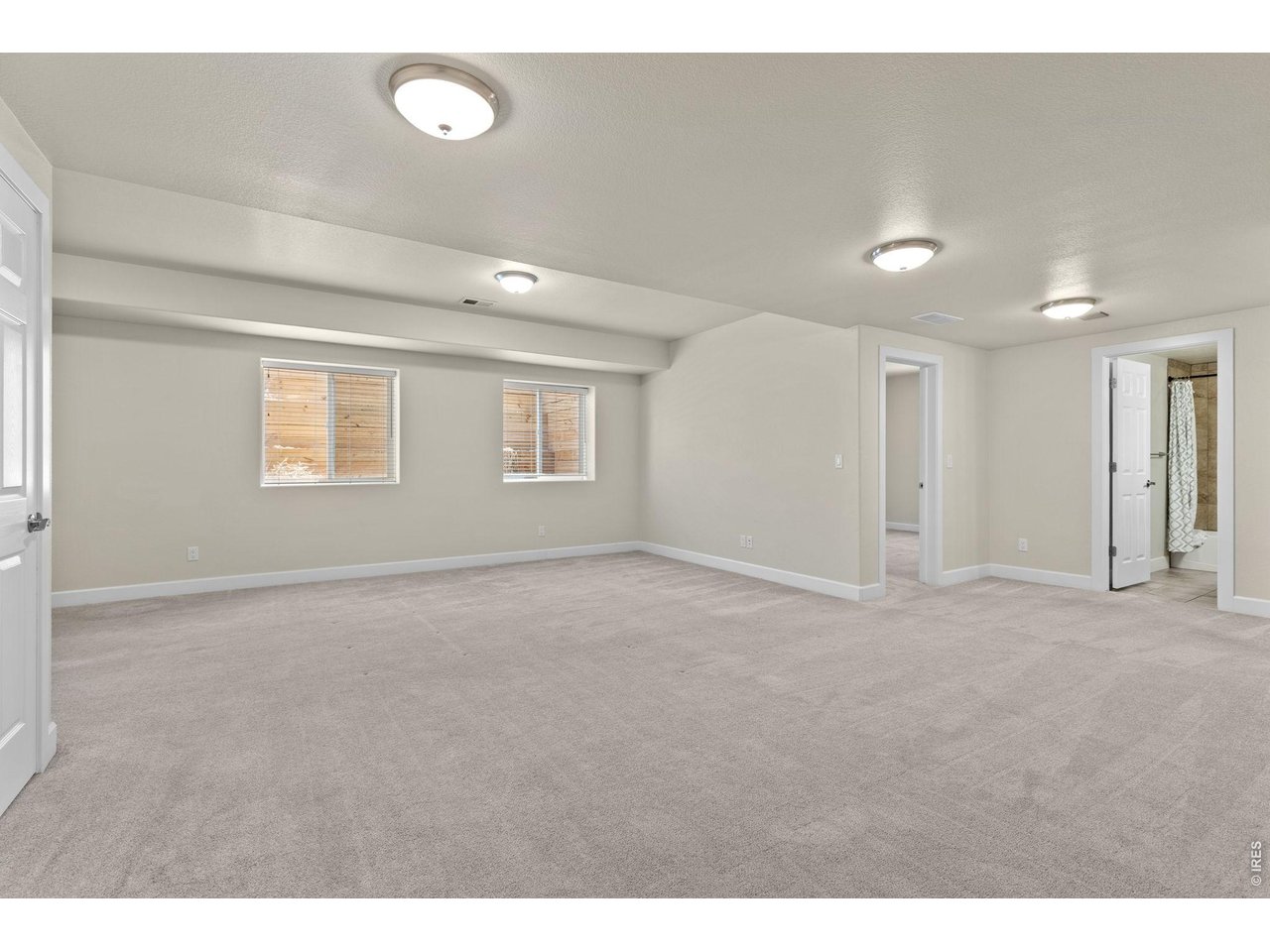 2002 Trail Ridge Drive Severance, CO 80615 - Photo 29 of 50 Another standout feature of the home is the fully finished basement featuring a large rec room that gives you flexibility for entertaining or relaxing.