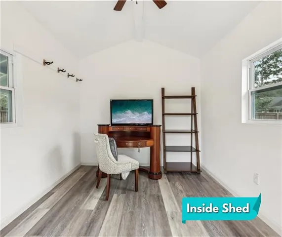 a front view of a house with a big yard