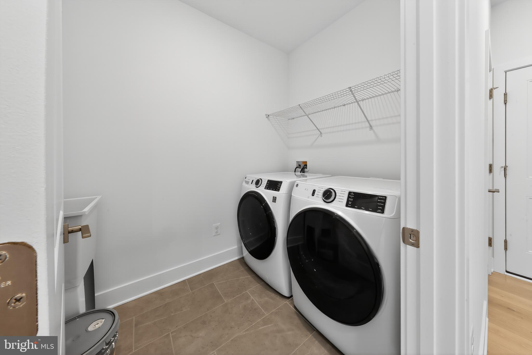 169 North Rdg Brk Drive Felton, DE 19943 - Photo 18 of 24 a utility room with dryer and washer