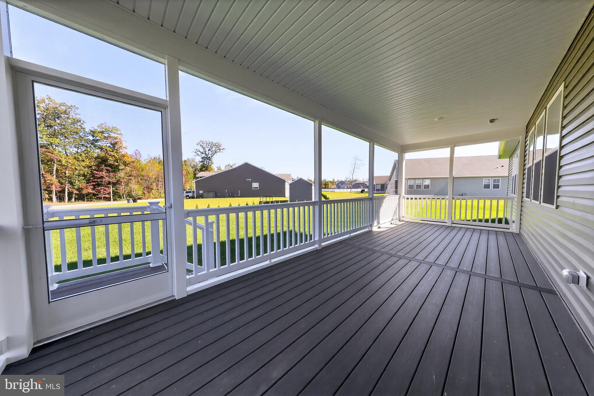 169 North Rdg Brk Drive Felton, DE 19943 - Photo 9 of 24 a view of a balcony with wooden floor