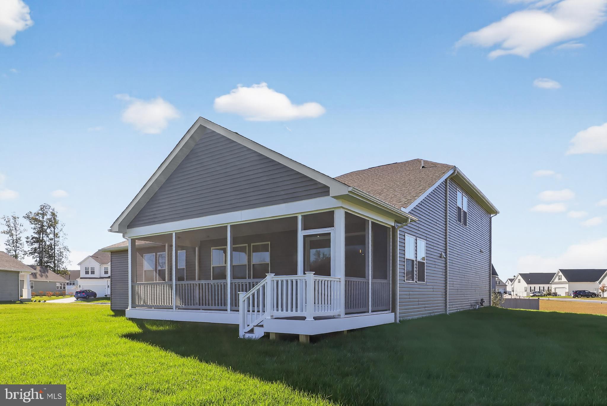 169 North Rdg Brk Drive Felton, DE 19943 - Photo 10 of 24 a view of a house with a yard and sitting area
