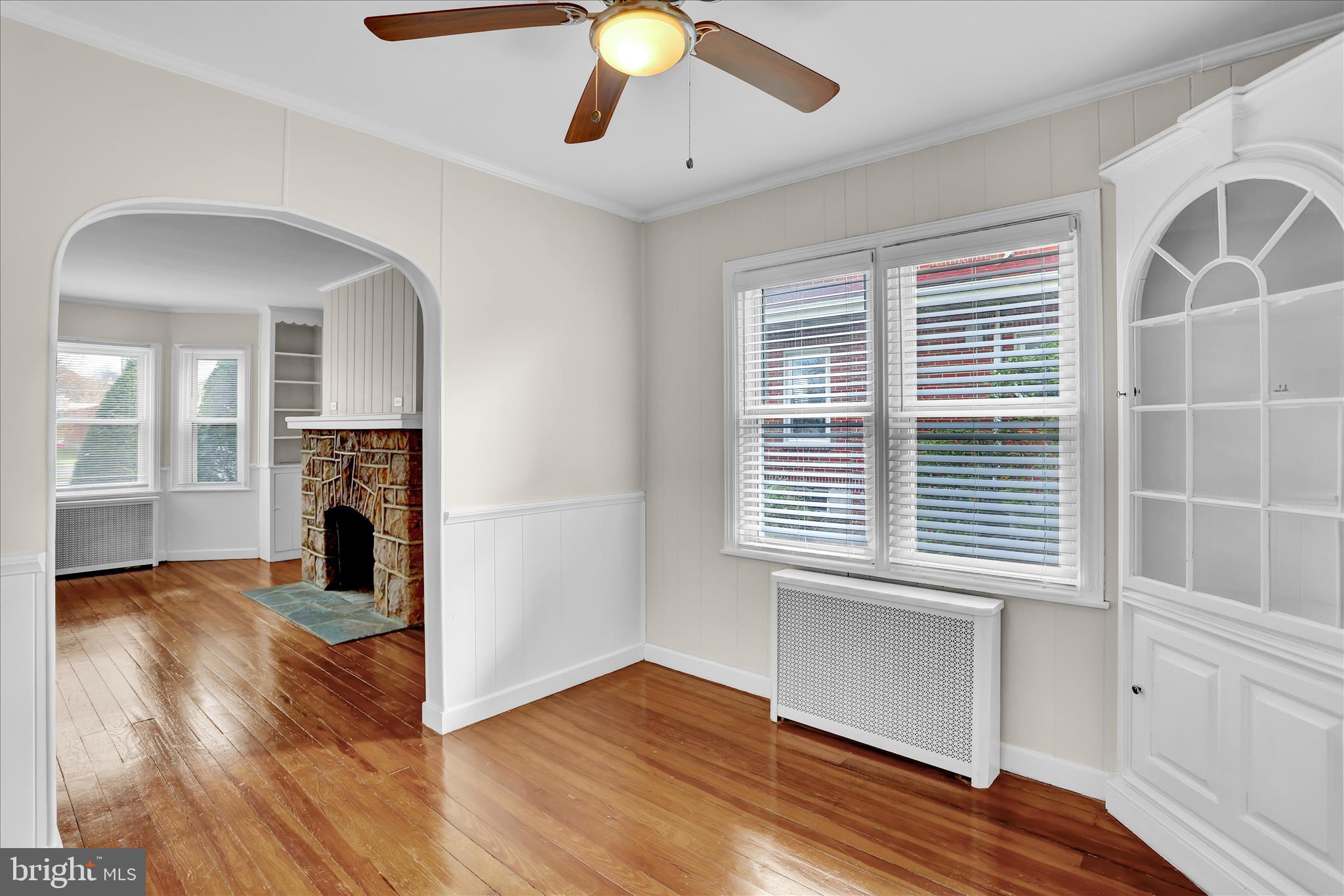 4710 Perkiomen Avenue Reading, PA 19606 - Photo 13 of 39 a view of livingroom with hardwood floor and a ceiling fan