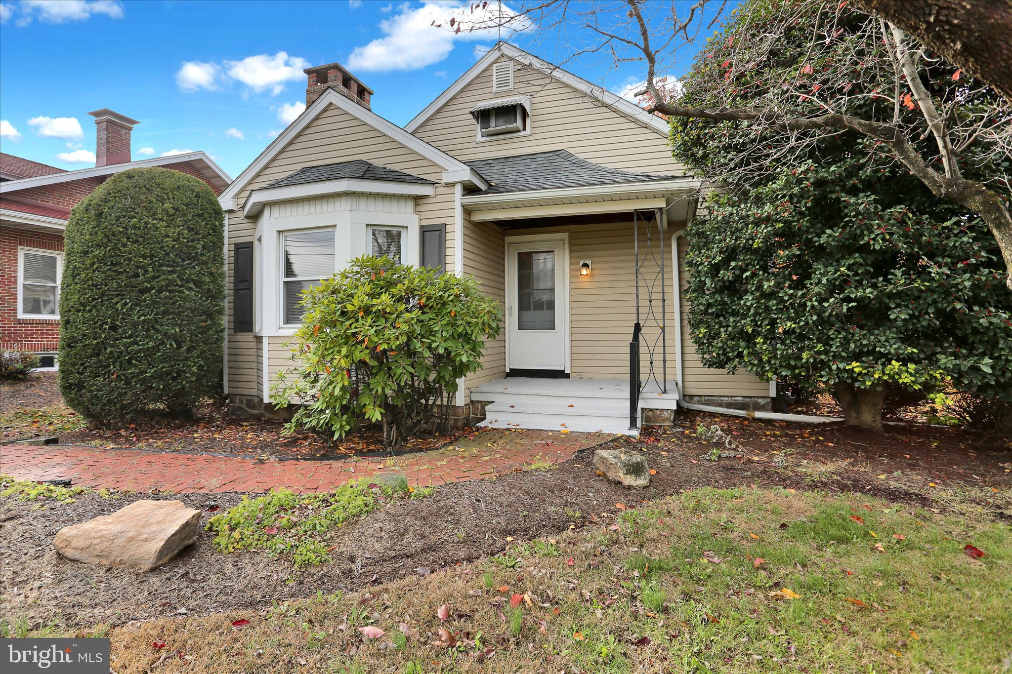 4710 Perkiomen Avenue Reading, PA 19606 - Photo 2 of 39 a front view of a house with garden