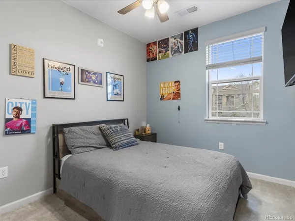 a bathroom with a shower and a glass door