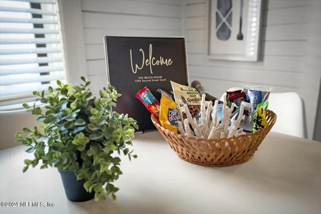 a view of a vase of flowers sitting on a floor