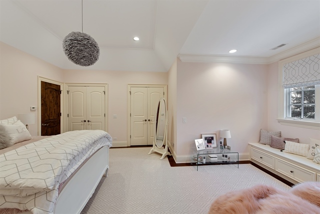 98 Woodley Road Winnetka, IL 60093 - Photo 13 of 21 a spacious bedroom with a bed and window