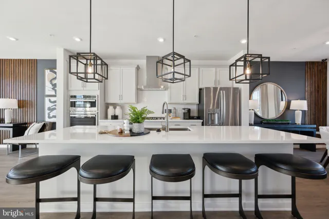 a kitchen with granite countertop counter space dining table and chairs