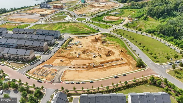 a front view of house with a garden and patio