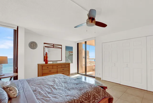 an aerial view of a house with a lake view