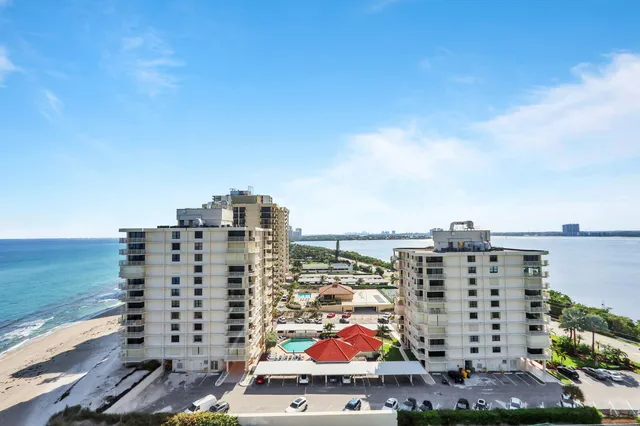 a view of city with ocean