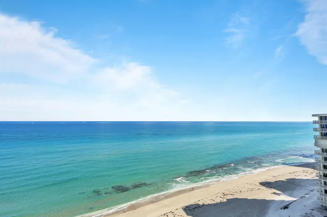 a view of city with tall buildings