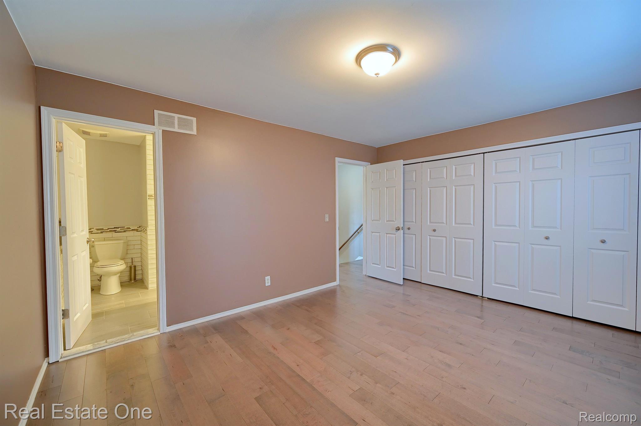 1372 Crescent Lane, Unit 301 Rochester, MI 48306 - Photo 14 of 41 Primary Bedroom w/Door to Fullbath