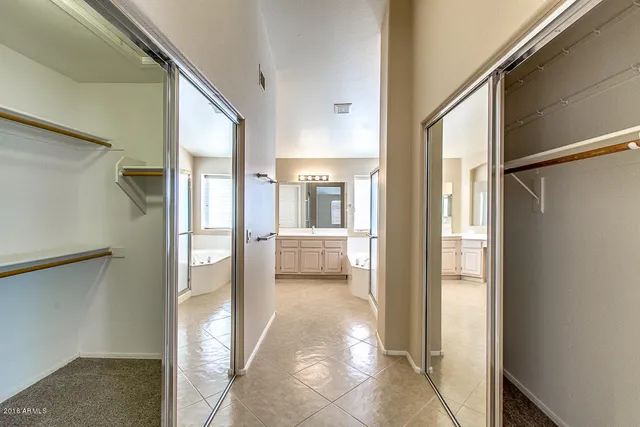 a view of a bathroom with a glass door