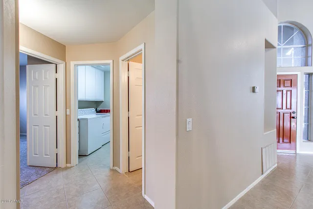 an empty room with a empty space and window