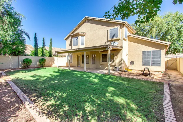 a view of a backyard with a small cabin