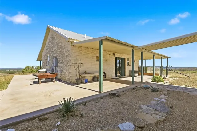a view of a terrace with chairs