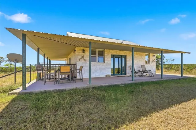 a patio with garden view