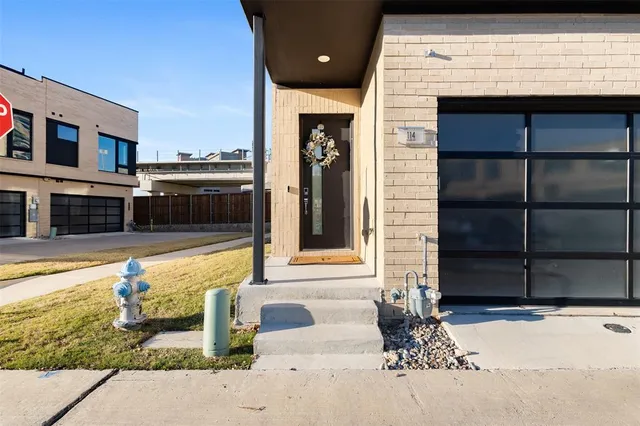 a front view of a house with a outdoor space
