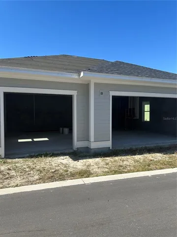 a view of a backyard of a house