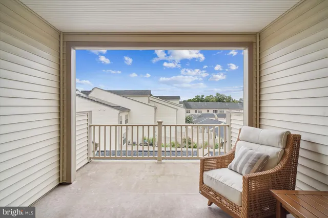 a view of a porch with furniture