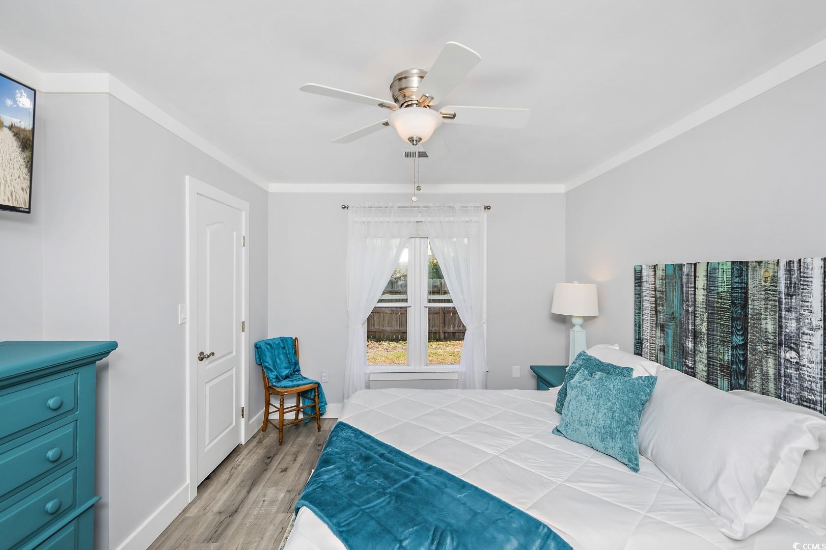 21 Pine Valley Lane Surfside Beach, SC 29575 - Photo 22 of 40 Bedroom featuring ceiling fan, light hardwood / wo