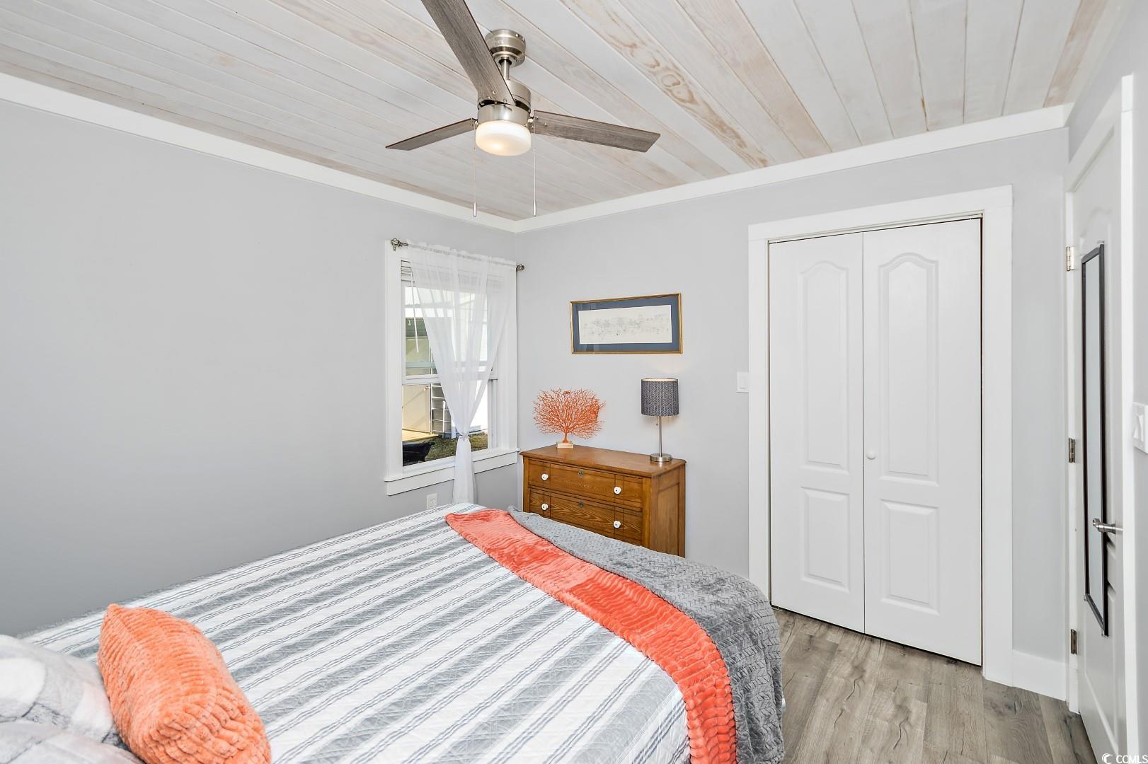 21 Pine Valley Lane Surfside Beach, SC 29575 - Photo 30 of 40 Bedroom with ceiling fan, crown molding, light har