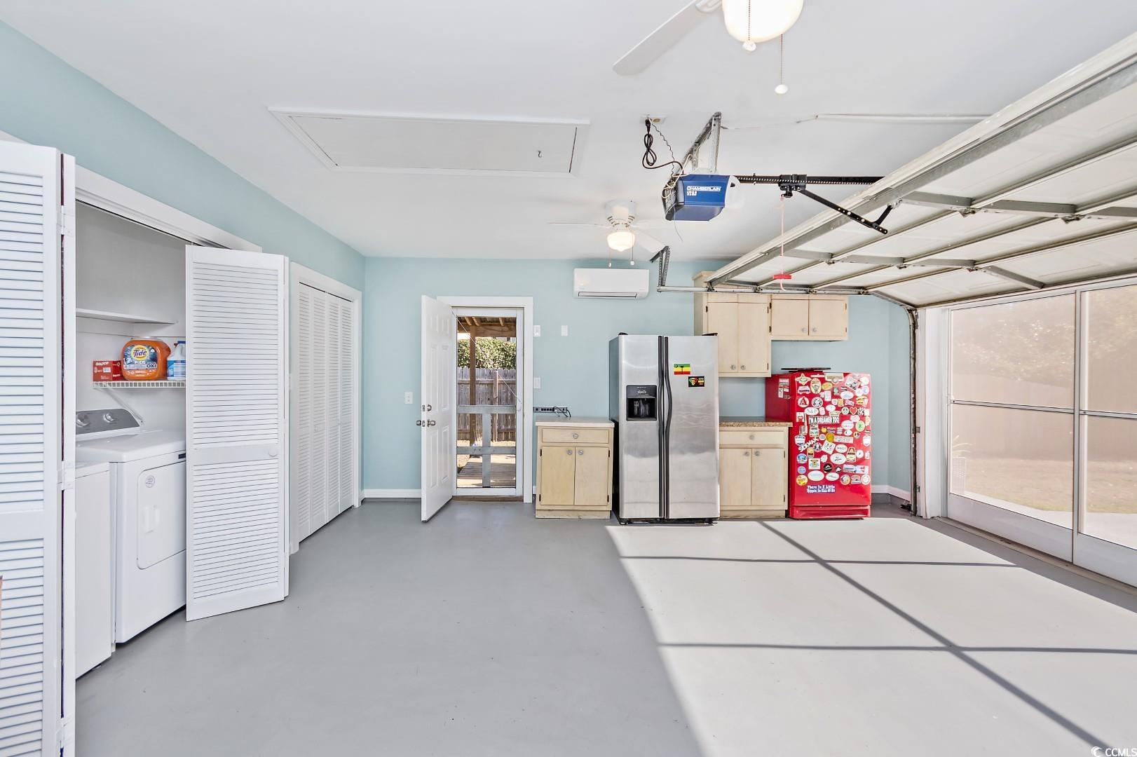 21 Pine Valley Lane Surfside Beach, SC 29575 - Photo 32 of 40 Garage featuring washer and clothes dryer, ceiling