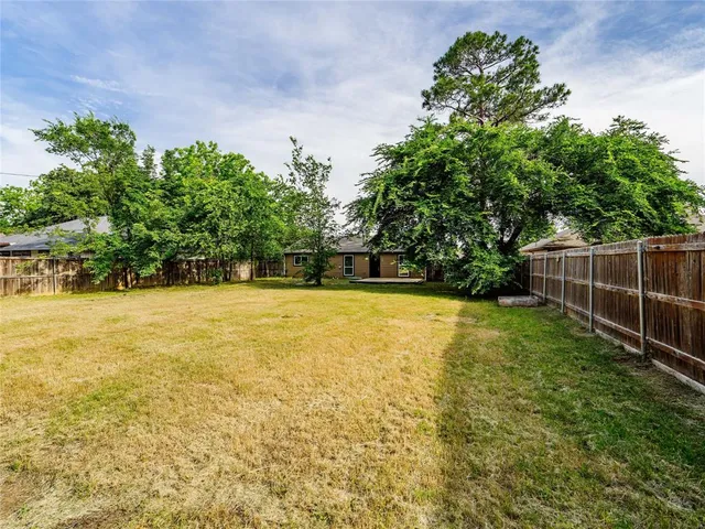 a view of a swimming pool with an outdoor space