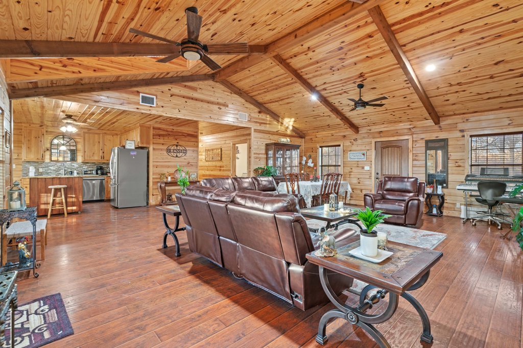 1843 Farm To Market 969 Elgin, TX 78621 - Photo 3 of 28 a living room with lots of furniture and center island