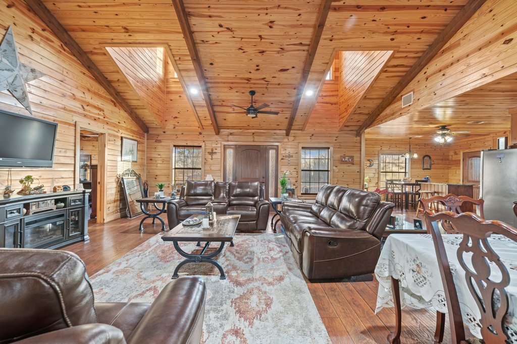 1843 Farm To Market 969 Elgin, TX 78621 - Photo 4 of 28 a living room with furniture and a flat screen tv