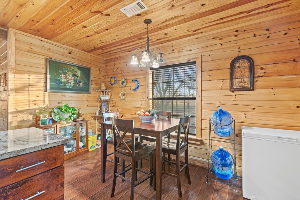 1843 Farm To Market 969 Elgin, TX 78621 - Photo 10 of 28 a view of a dining room with furniture