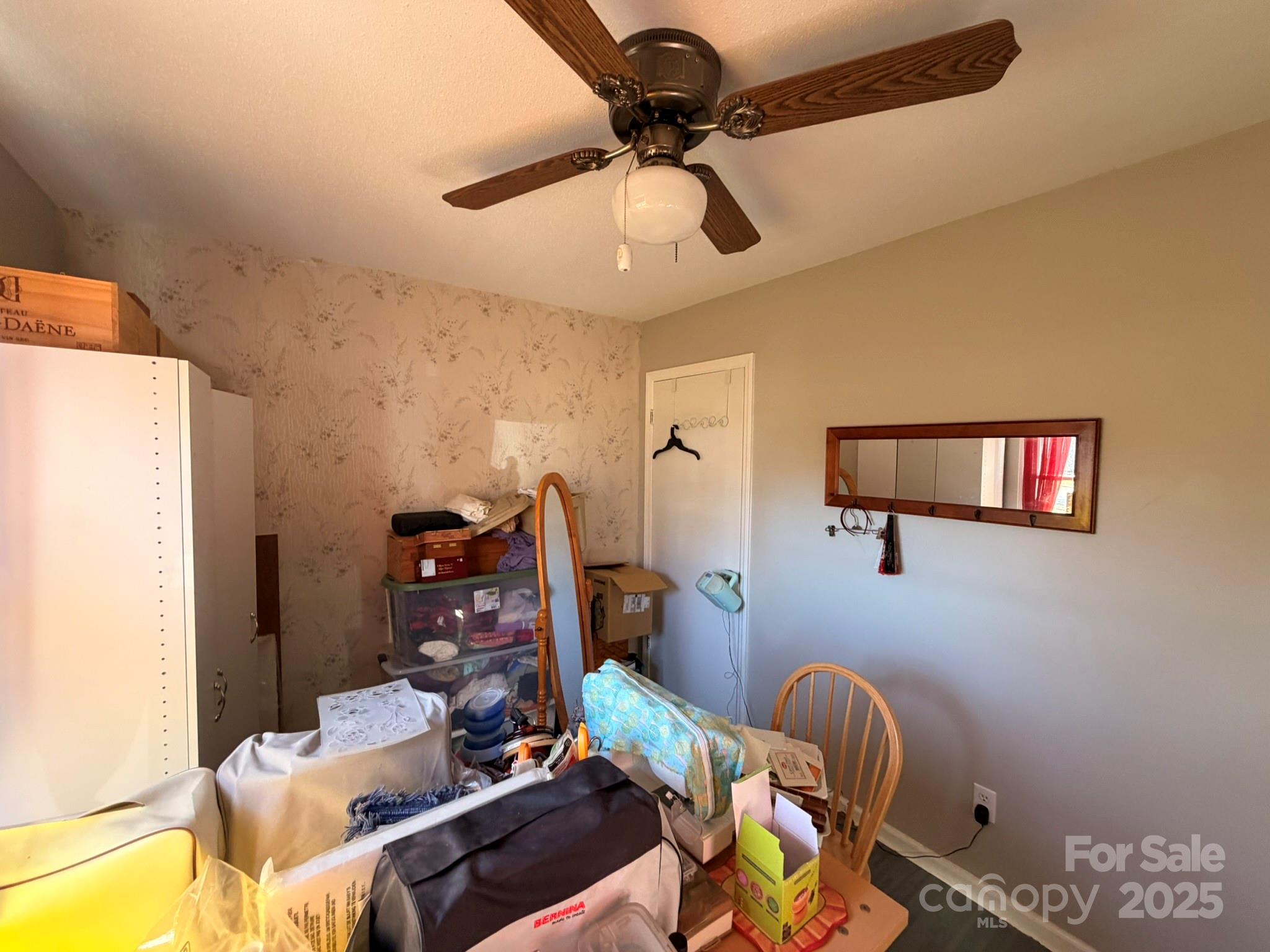 284 Jennings Road North Wilkesboro, NC 28659 - Photo 11 of 11 a bedroom with furniture and a fan