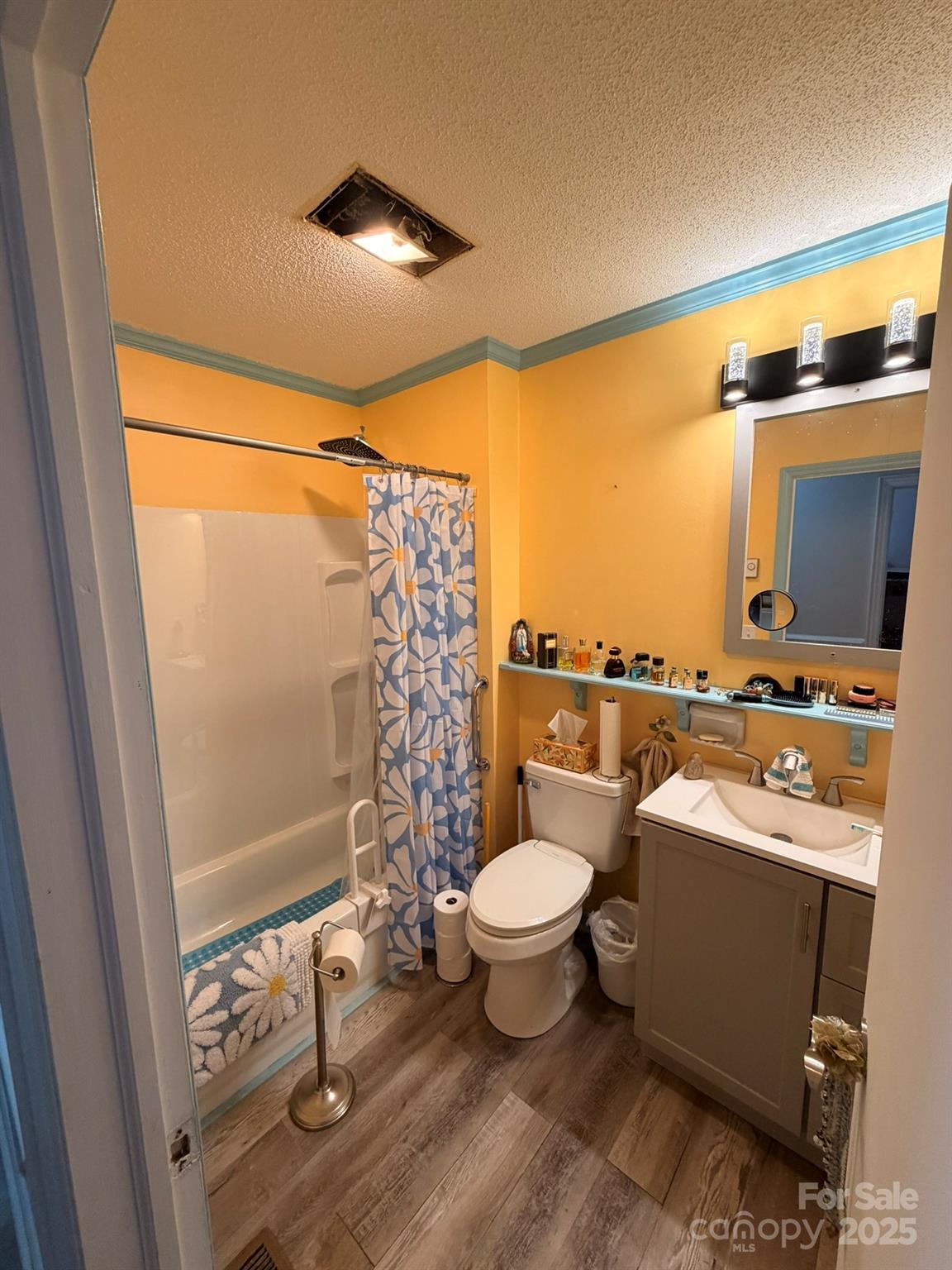 284 Jennings Road North Wilkesboro, NC 28659 - Photo 8 of 11 a bathroom with a sink toilet a mirror and shower